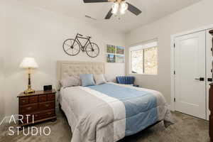 Bedroom featuring carpet flooring and a ceiling fan