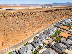 Aerial view of residential area featuring a mountain backdrop