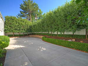 View of fenced backyard