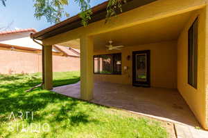 View of patio with ceiling fan