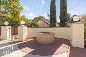 View of patio / terrace featuring a gate