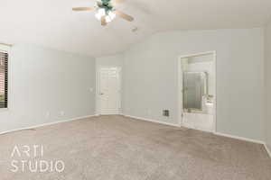 Unfurnished bedroom with lofted ceiling, carpet, a ceiling fan, a textured ceiling, and connected bathroom