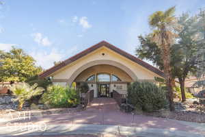Doorway to property with stucco siding