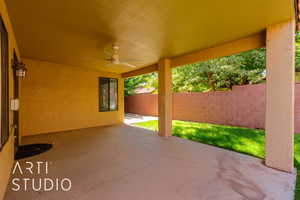 View of patio featuring ceiling fan