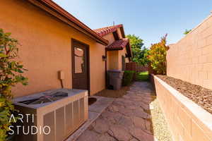 View of patio with a gate