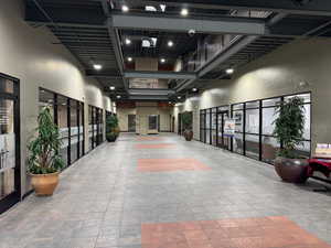 Common area with a towering ceiling