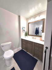 Full bathroom featuring vanity and a tile shower