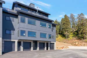 View of front facade with stone siding
