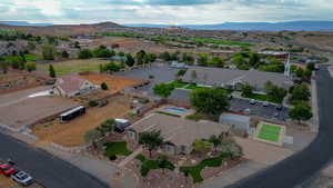 Aerial perspective of suburban area featuring a mountainous background