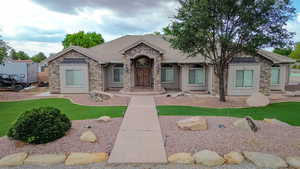 frontstucco siding, and a standing seam roof
