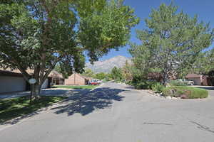 View of asphalt street with a mountain view