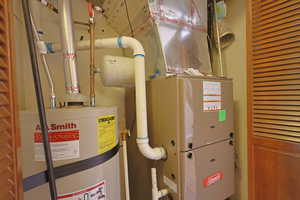 Utilities with strapped water heater and heating unit