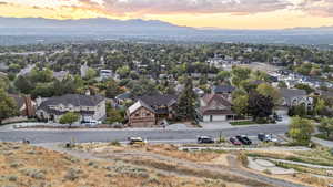 Aerial view at dusk of a mountain view and a residential view