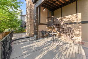 View of patio/deck out of the basement apartment