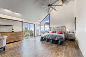 Master Bedroom featuring high vaulted ceiling, access to outside, wood finished floors, and a ceiling fan