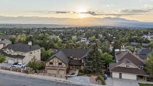 Aerial view at dusk of a mountain view and a residential view