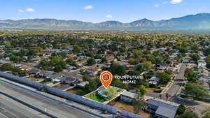 Aerial view of residential area with a mountain backdrop