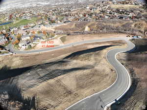 Aerial overview of property's location with nearby suburban area
