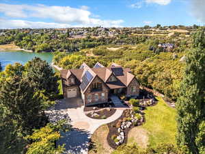 View from above of property with a large body of water
