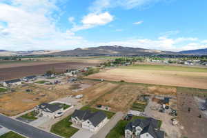 Overview of rural landscape with a mountain backdrop