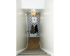 Stairs featuring baseboards