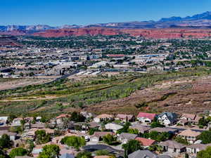 Aerial view of residential area with a mountainous background