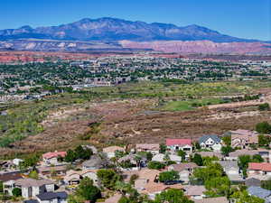 Aerial view of residential area featuring a mountain backdrop