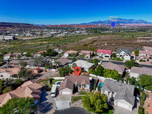Aerial view of residential area with a mountainous background