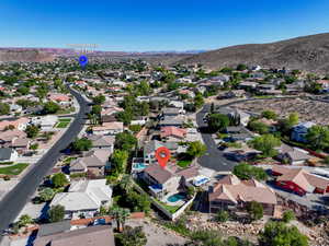 Aerial view of residential area with mountains
