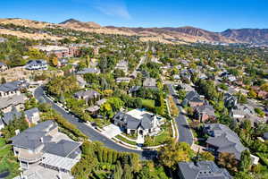 Aerial view of residential area with a mountainous background