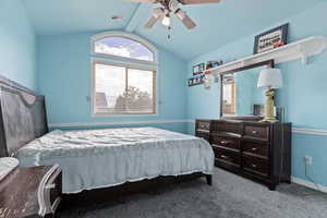 Bedroom with carpet and a ceiling fan