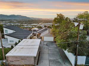 Aerial view at dusk of a residential view and a mountain view