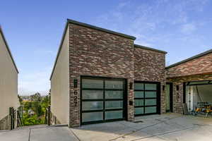 Garage featuring driveway