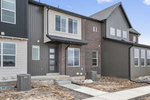 View of front of home with brick siding
