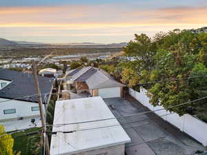 Aerial view at dusk of a mountain view and a residential view