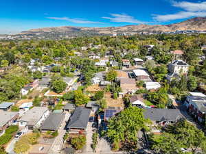 Aerial view of residential area with mountains