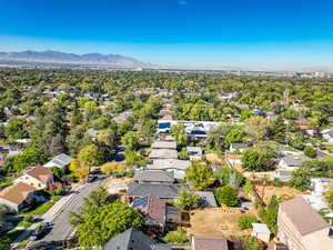 Aerial view of residential area featuring mountains