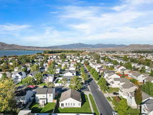 Aerial view of residential area featuring a water and mountain view