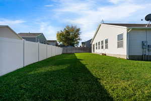 View of fenced backyard