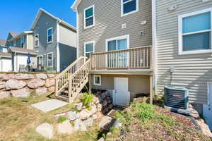 Step down to large storage space under townhome with easy access through back door!