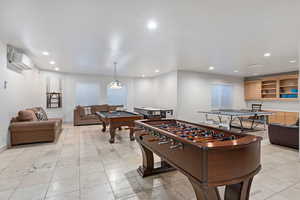 Rec room with recessed lighting, light tile patterned floors, and billiards table
