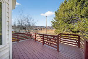 Wooden deck featuring a mountain view