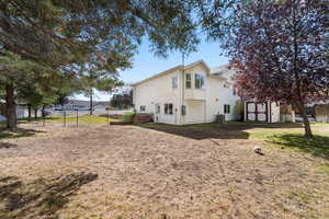 View of home's exterior with a storage shed and a central air condition unit
