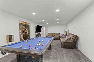 Game room featuring carpet floors, recessed lighting, billiards table, and water heater