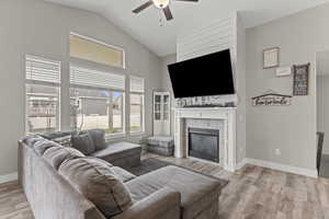 Great Room with board and batten entertainment above fireplace insert.