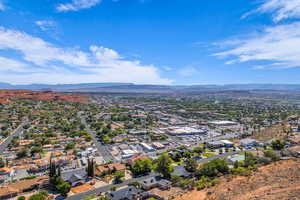 Aerial view of residential area with a mountain backdrop