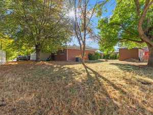 View of yard with shed