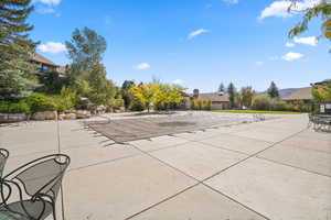View of patio / terrace featuring a community pool