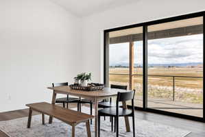 Dining space featuring light wood finished floors and baseboards
