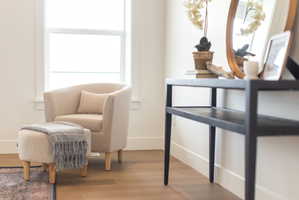 Living area featuring light wood finished floors and plenty of natural light